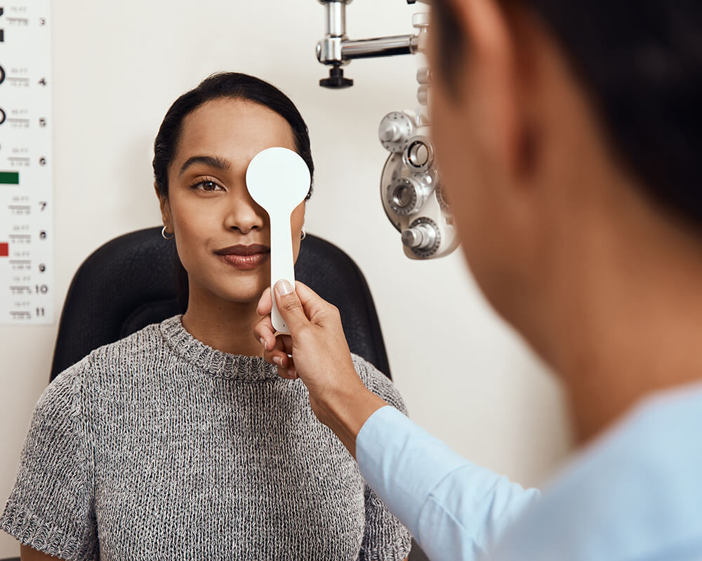 Woman having her eyes examined