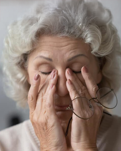 Woman with dry strained eyes